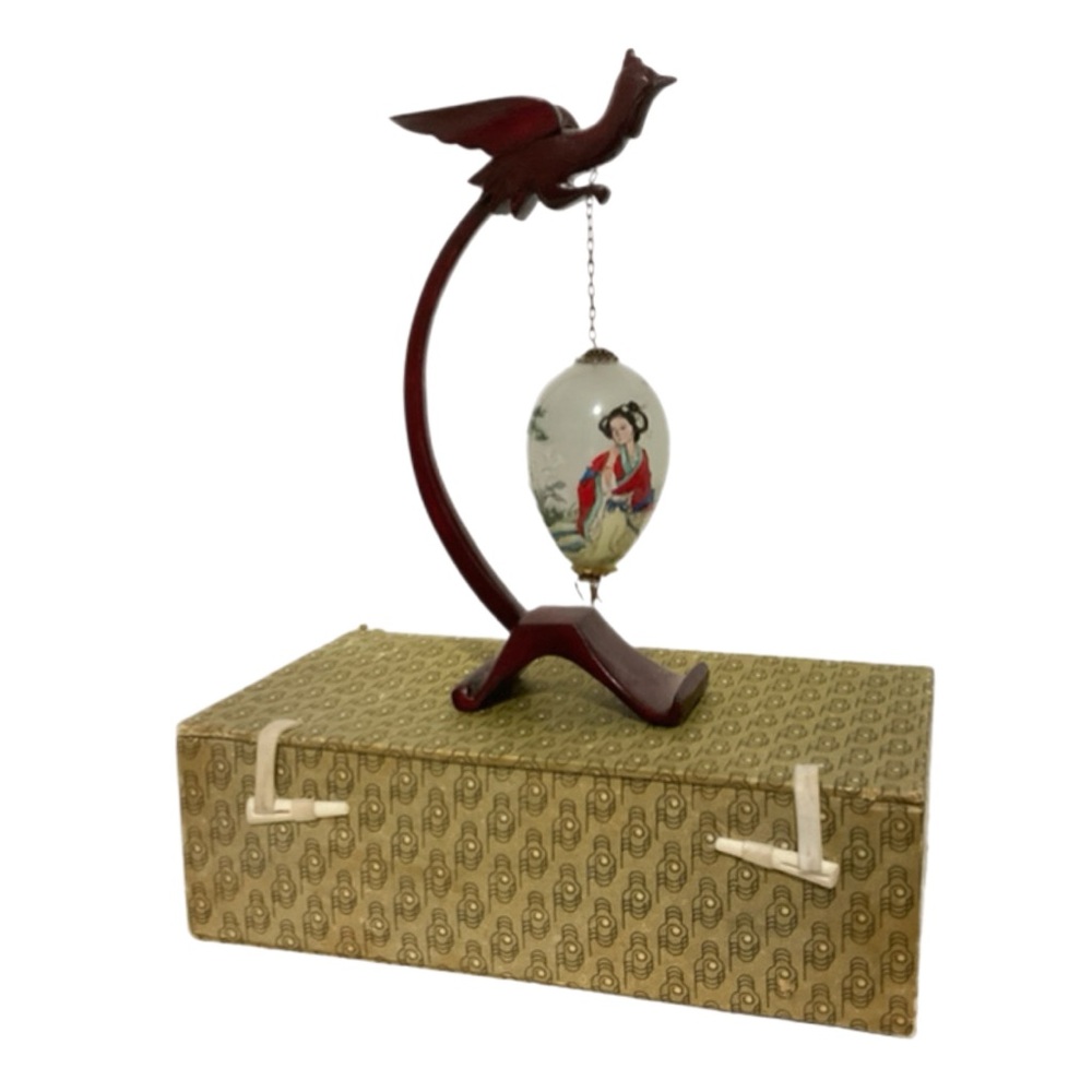 Blown Glass Reverse Hand Painted Egg Ornament on Wooden Dragon Stand